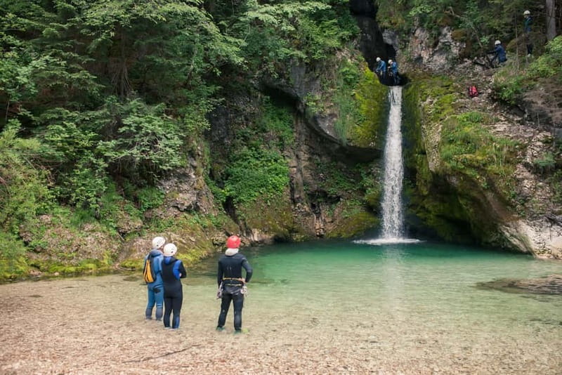 Bled: Triglav National Park Canyoning Adventure with Photos - Getting kitted up at the start: wetsuit, helmet, harness, shoes