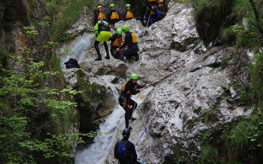 Bovec: Half-Day Canyoning Trip - Getting from Bovec to Soteska Sušca: base, bus ride, and the safety talk