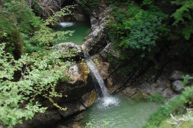 Canyoning In The Triglav National Park - Entering the canyon: jumps, rappels, and the 50-meter waterfall moment