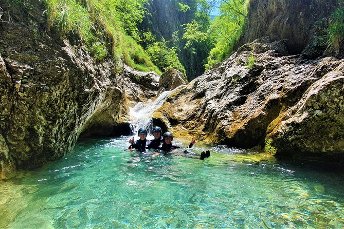 Dynamic Adventure Canyoning in Bovec with Free Photos and Videos - The 12-meter waterfall rappel: the moment you remember