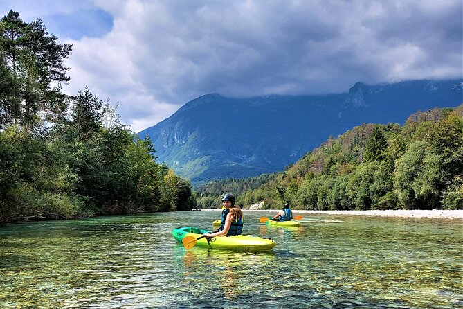 Explore Soča River on Sit on top Kayak with Free Photos - Swimming, balance practice, and why safety briefing matters