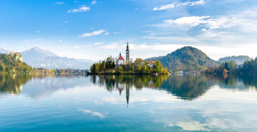 From Ljubljana: Lake Bled & Postojna Cave with Entry Tickets - Lake Bled sightseeing: the emerald water, the island stop, and optional Pletna