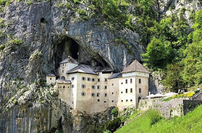 Postojna Cave and Predjama Castle Trip including entry tickets - What to pack: layers, comfort shoes, and cave-proof planning