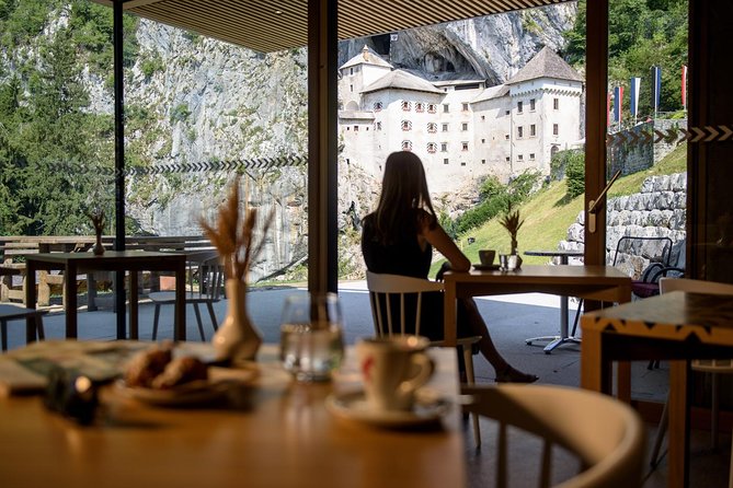 Postojna Cave & Photostop Predjama castle - Group Tour from Koper - Predjama Castle: a fairytale stop with only 15 minutes