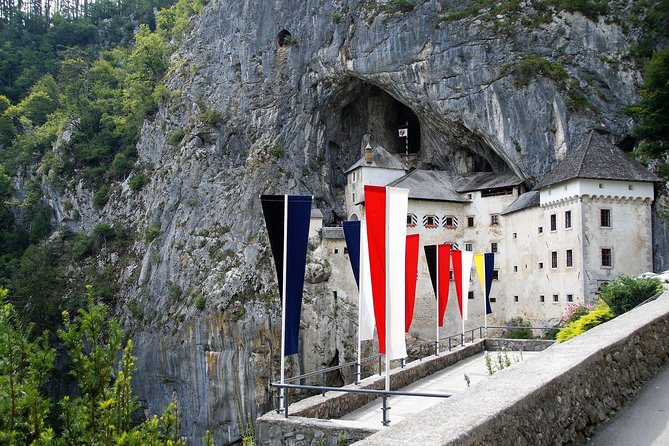 Postojna Cave with Train Ride and Predjama Castle Half Day Trip from Ljubljana - Entering Postojna Cave: Train First, Then the Guided Walk