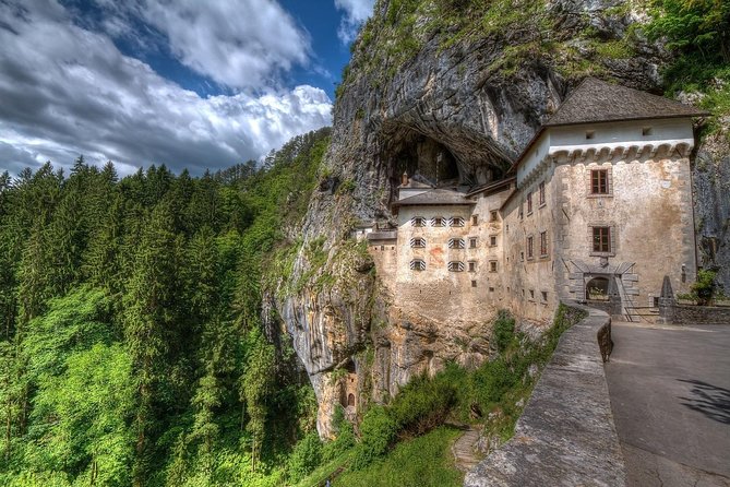 Postojna Caves and Predjama Castle. Private trip. - Predjama Castle: The Cliff Fortress That Feels Unreal