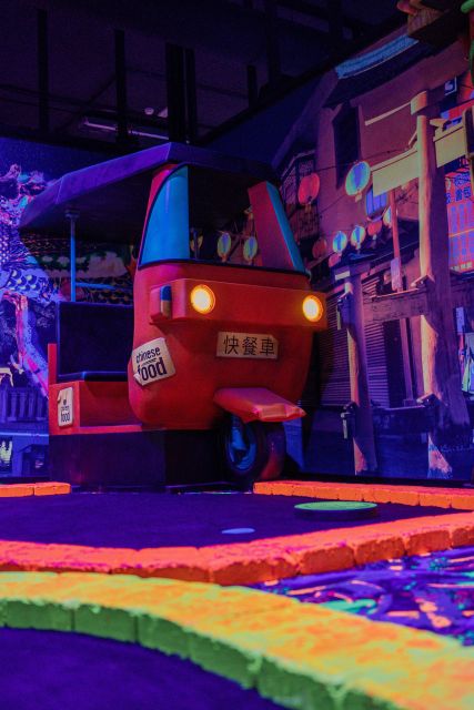 Woop! Glow golf: Ljubljana Btc City - The Route: 15 Holes, 4 Themed Rooms, One Around-the-World Game